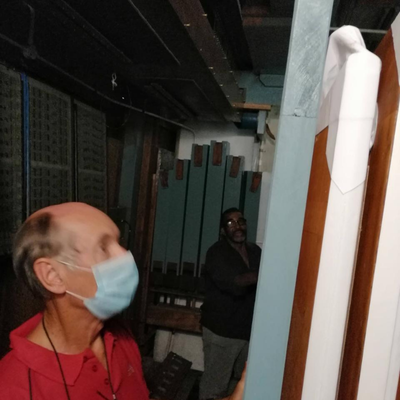 Technician cleaning pipes